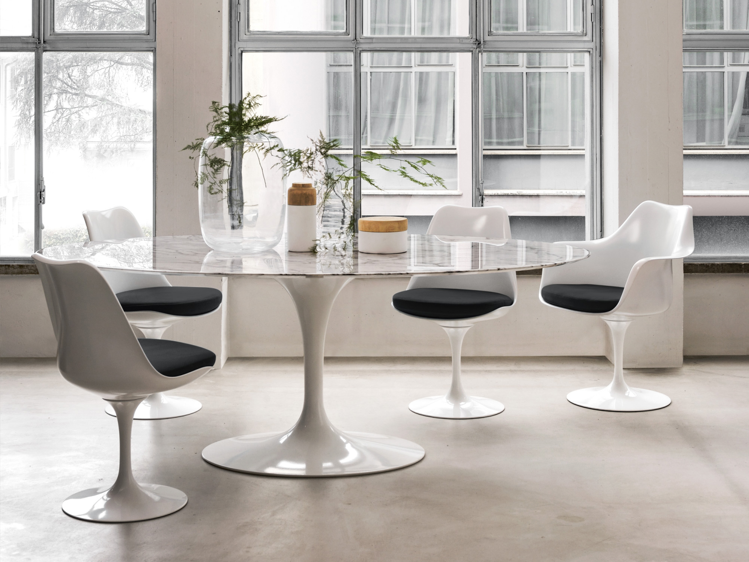 Saarinen Dining Table and Tulip Side and Armchairs